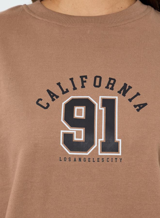 ستايلي طقم منسق من بنطال بأرجل واسعة وسويت شيرت بطبعة كتابة - Image 3